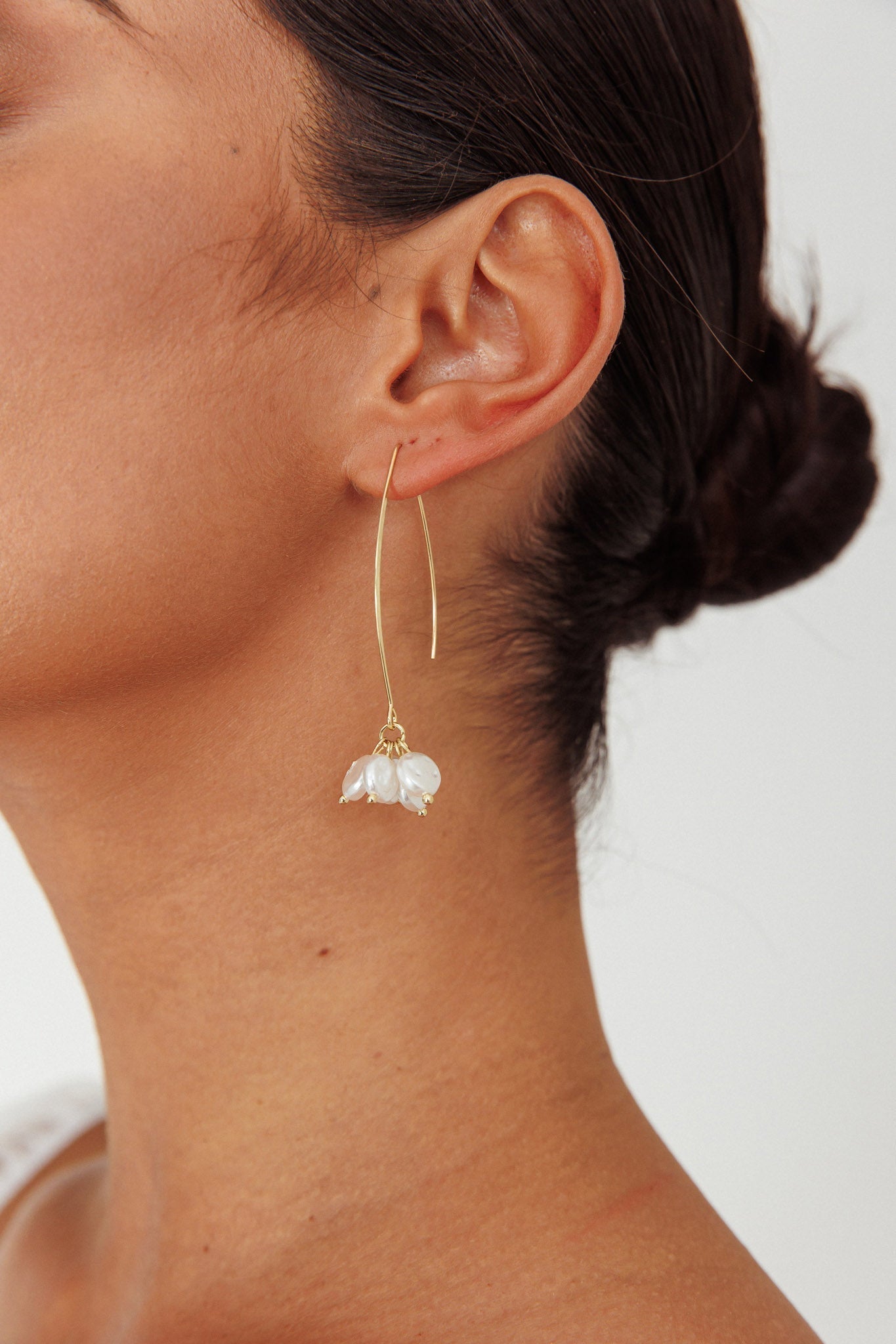 Long Hook Earrings with Golden Pearl Accents